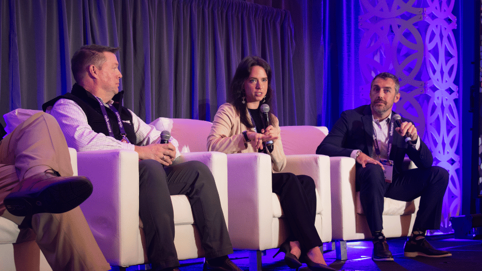 Panel of industry experts discussing advances in mRNA therapeutics, non-viral delivery technologies, and nucleic acid medicine development at a scientific conference.
